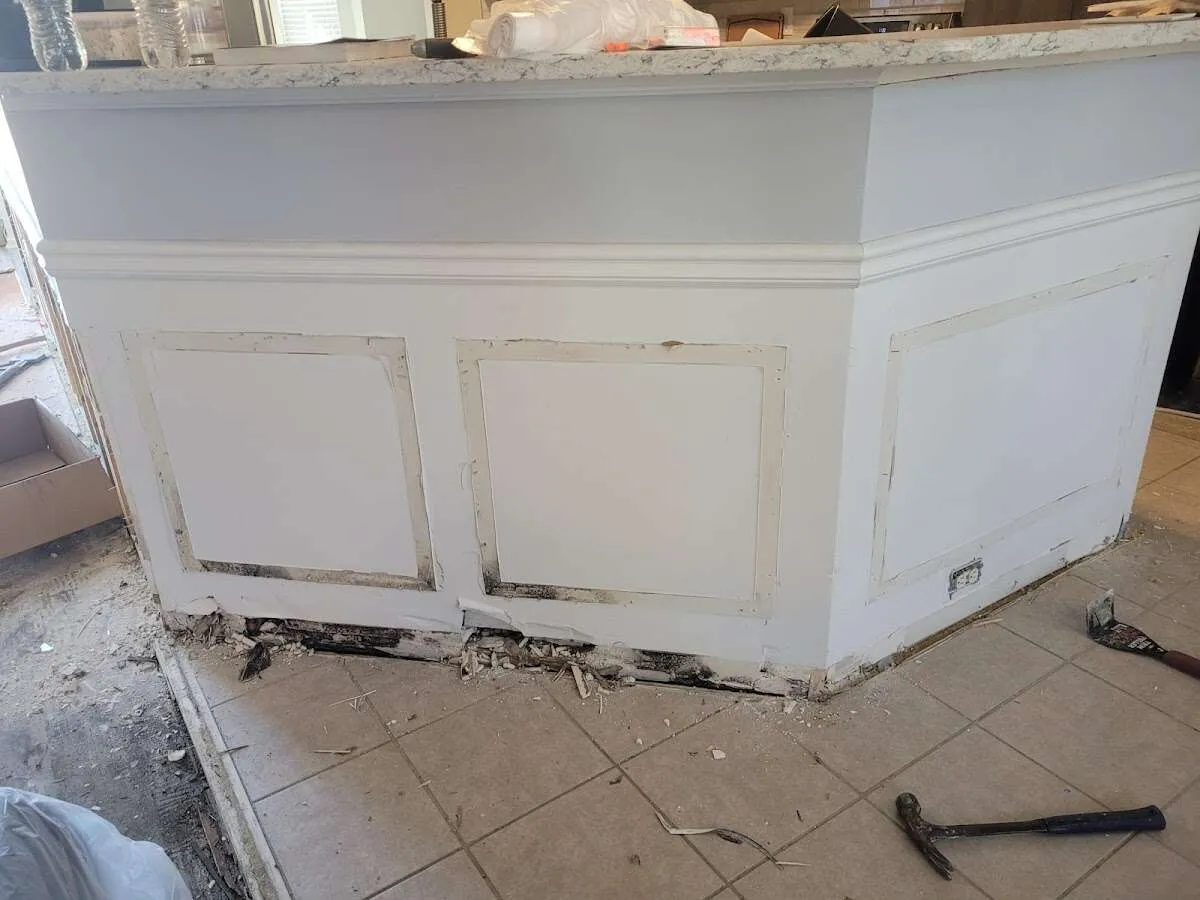Water damage and mold on kitchen during Storm Damage Restoration in Cranberry